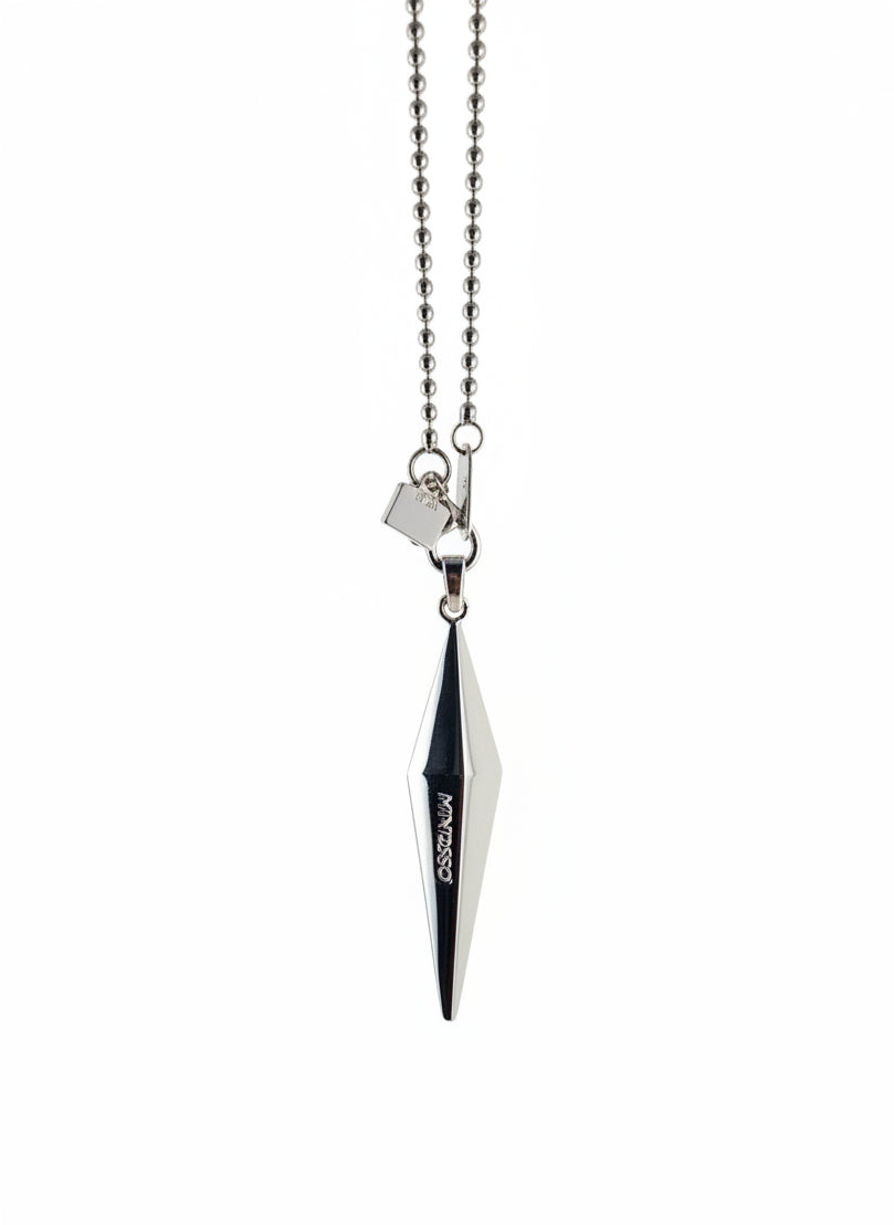 Metallic pendant necklace on a white background