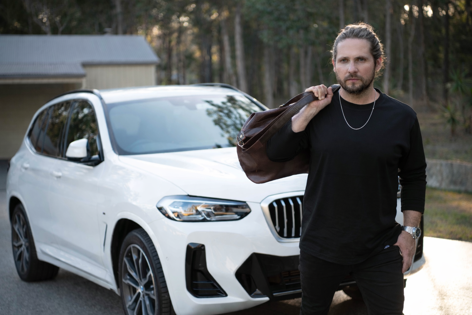 Singer-songwriter Andy Penkow, brand ambassador for MRVP & Co, wearing a solid sterling silver chain.